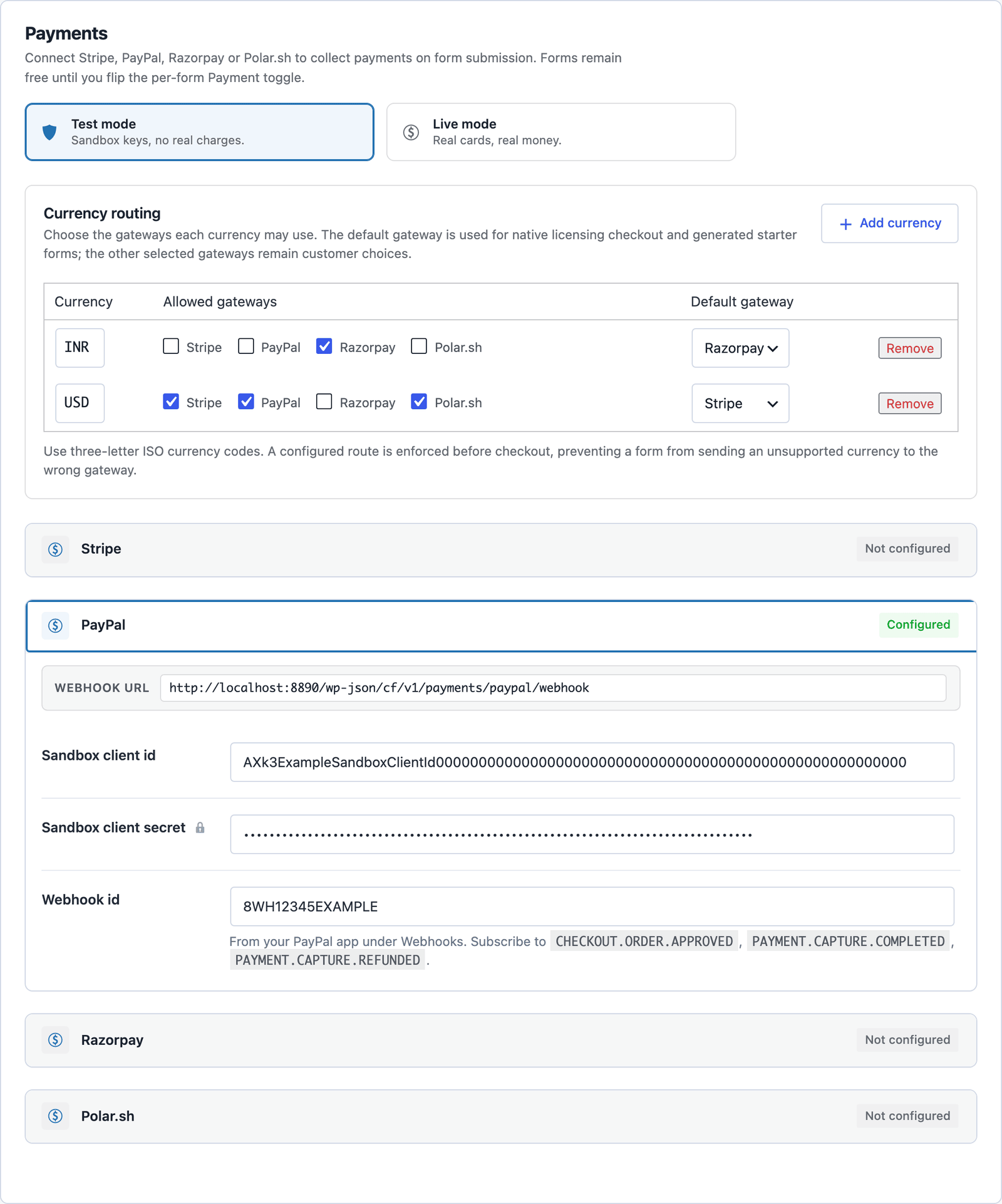 The Payments settings with Test mode selected, currency routing for INR and USD, and the PayPal card expanded with the webhook URL, sandbox client ID and secret